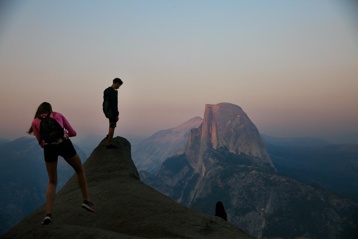 Two hikers on a hill