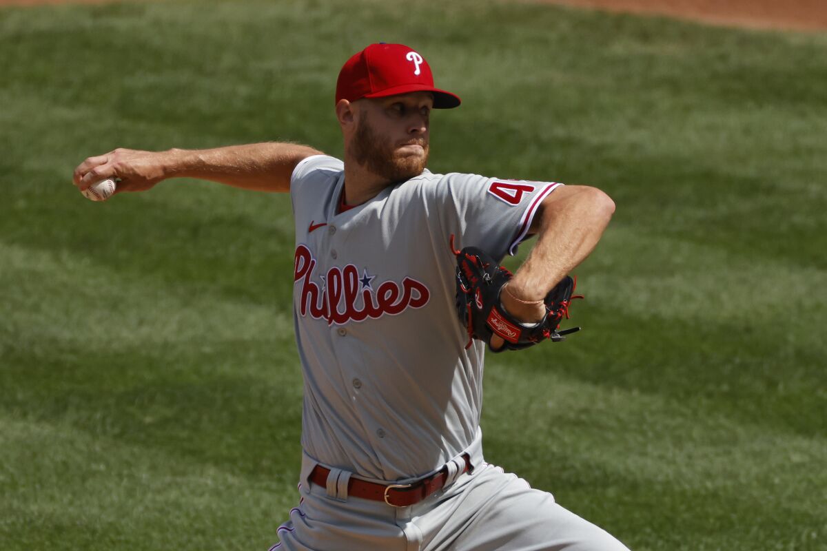 Philadelphia Phillies starting pitcher Zack Wheeler delivers a pitch during the first inning of a baseball game against the New York Mets on Monday, Sept. 7, 2020, in New York. (AP Photo/Adam Hunger)