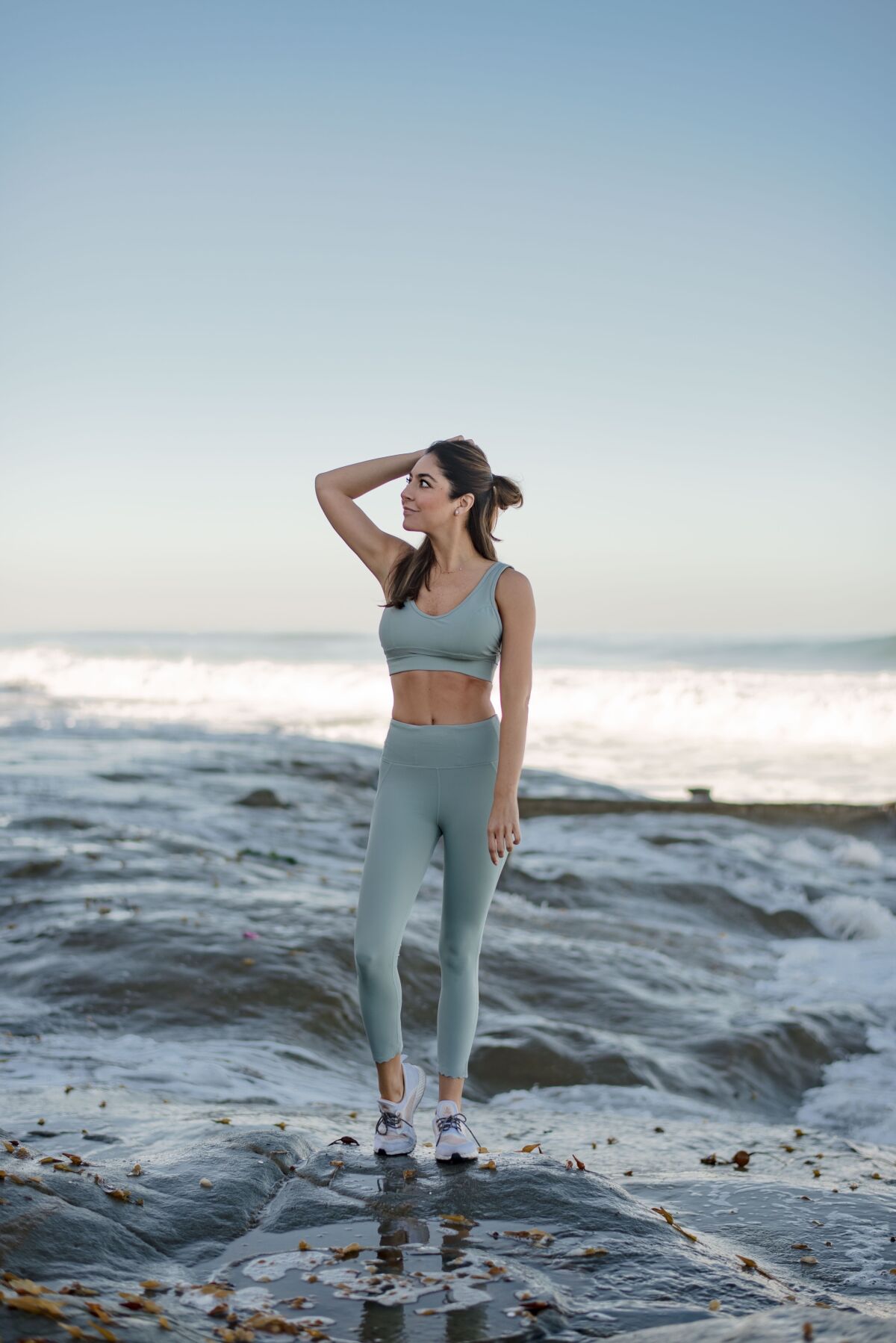 In addition to SoulCycle and Barry's Bootcamp, one of Andrea Lopez-Velarde's favorite ways to work out is running on the beach.