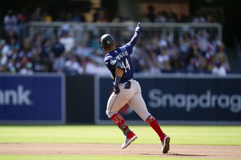 Seattle Mariners' Julio Rodriguez reacts after hitting a two-run home run during the fourth inning of a baseball game against the San Diego Padres, Monday, July 4, 2022, in San Diego. (AP Photo/Gregory Bull)