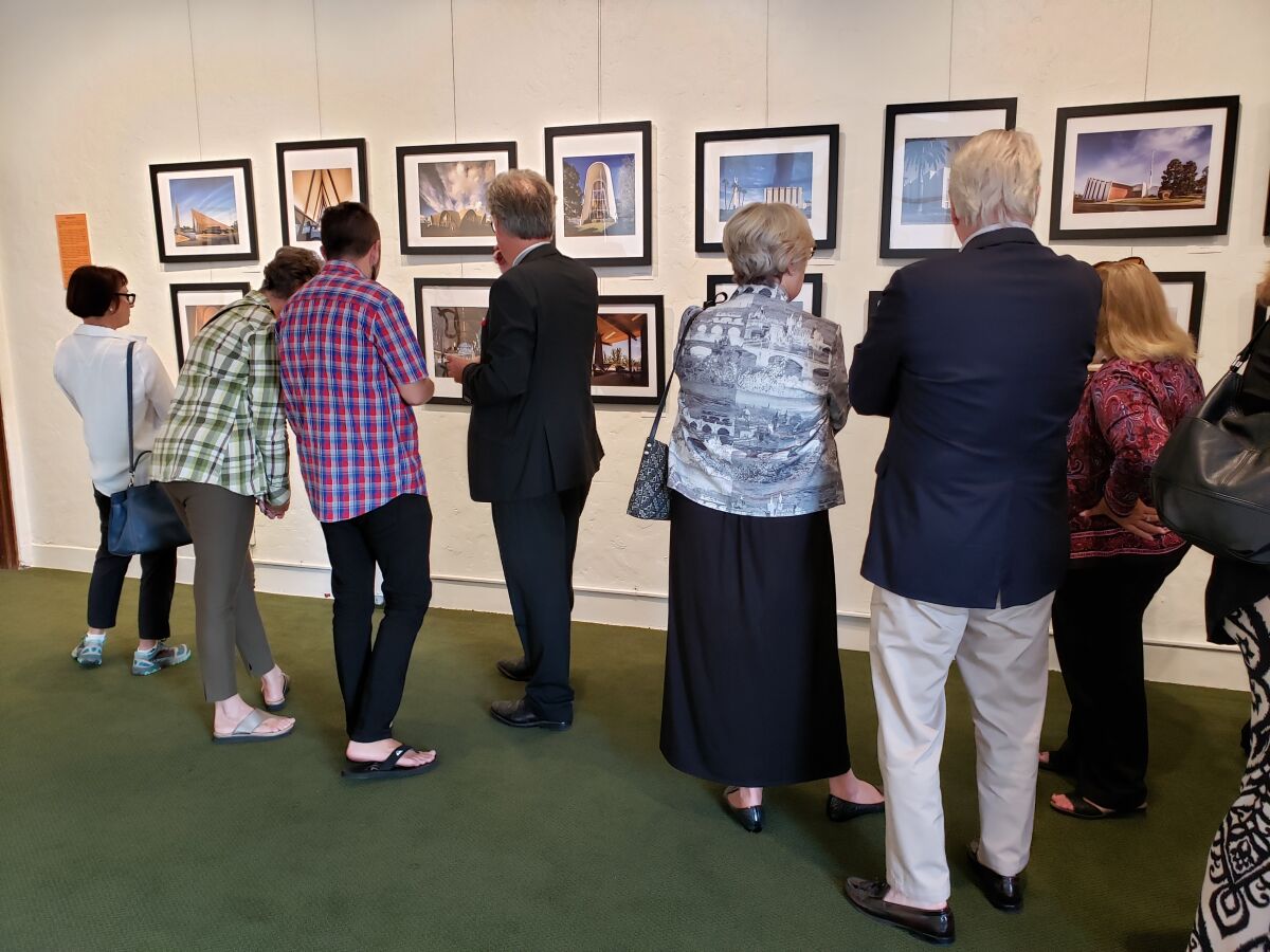 On opening night, Sept. 27, supporters gather at St. James-by-the-Sea’s gallery to view the ‘Mid-Century Modern Places of Worship’ exhibit.