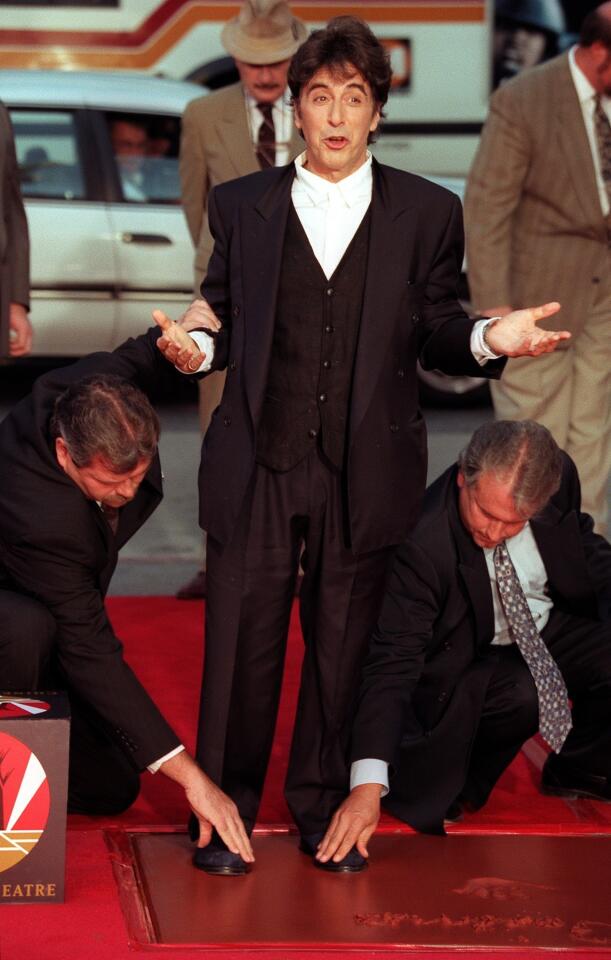 Al Pacino left prints of his hands and feet in wet concrete in front of the Chinese Theatre on Hollywood Boulevard on Oct. 16, 1997.