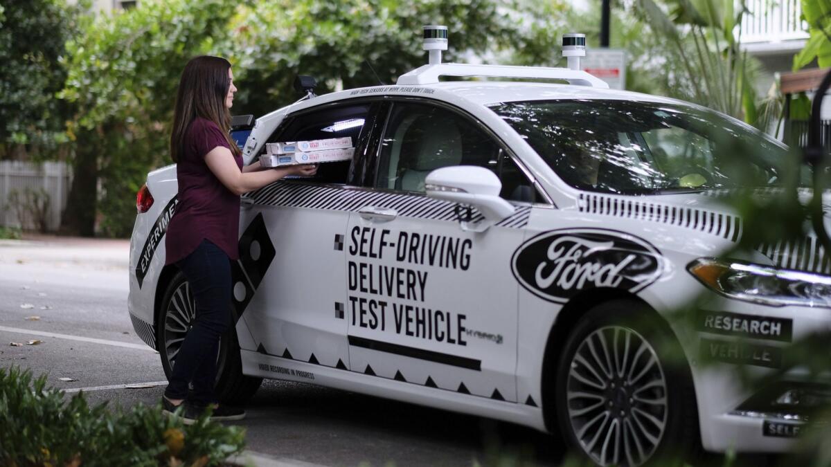 Ford and partners, including Domino's Pizza and Lyft, have pilot programs to see how consumers react to autonomous vehicles.