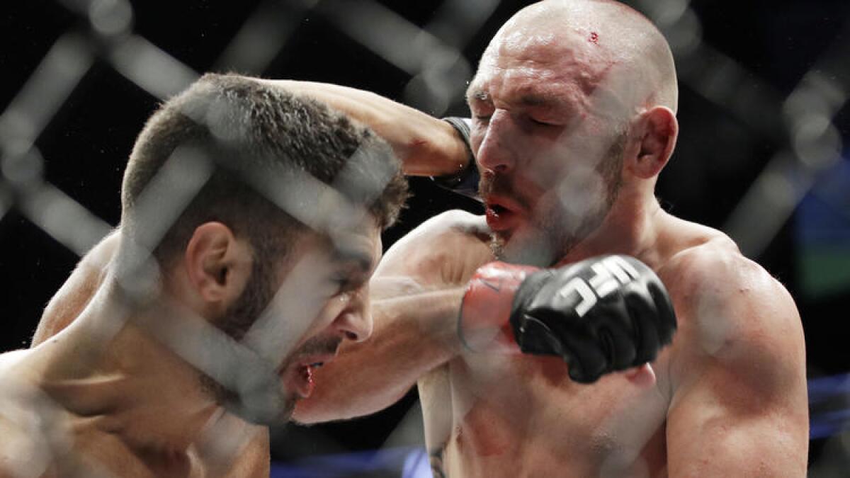 David Teymur, left, and Lando Vannata trade blows during their lightweight fight at UFC 209.