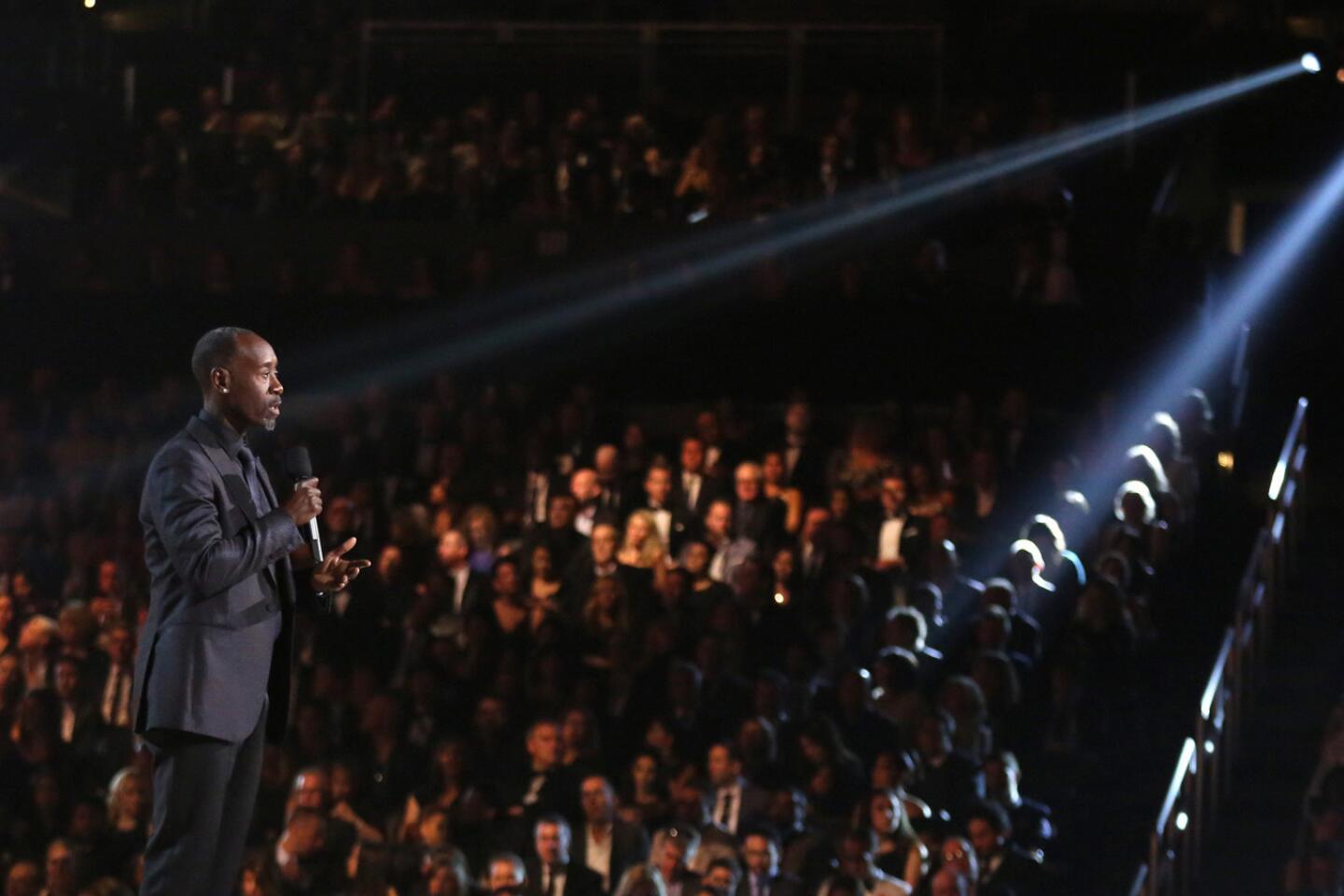 Don Cheadle introduces a performance by Kendrick Lamar.