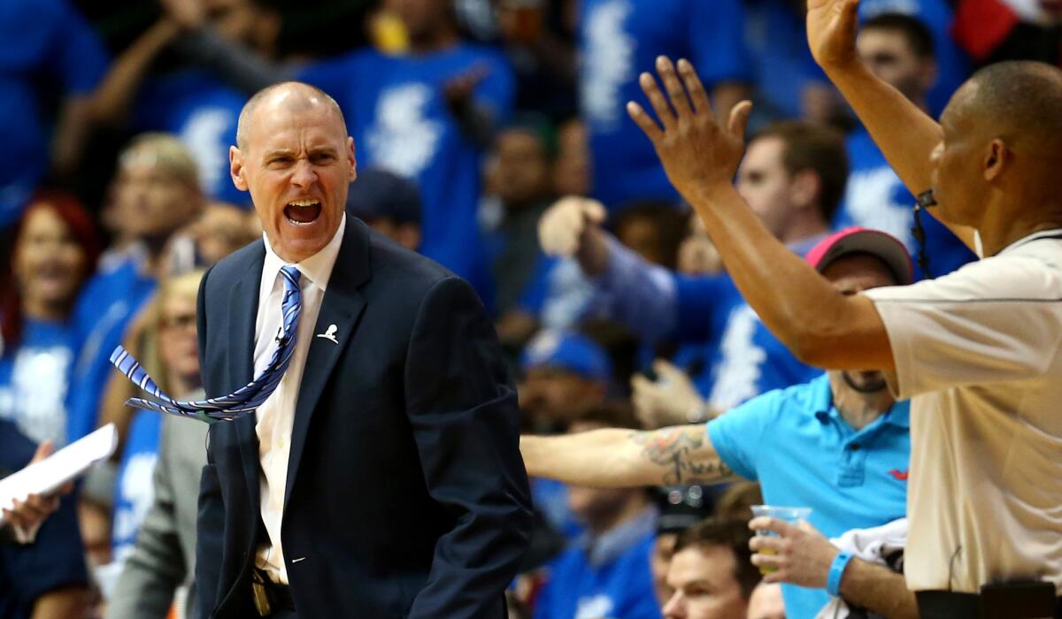 Mavericks Coach Rick Carlisle questions a call during Game 3 of his team's playoff series against the Rockets in Dallas on April 24.