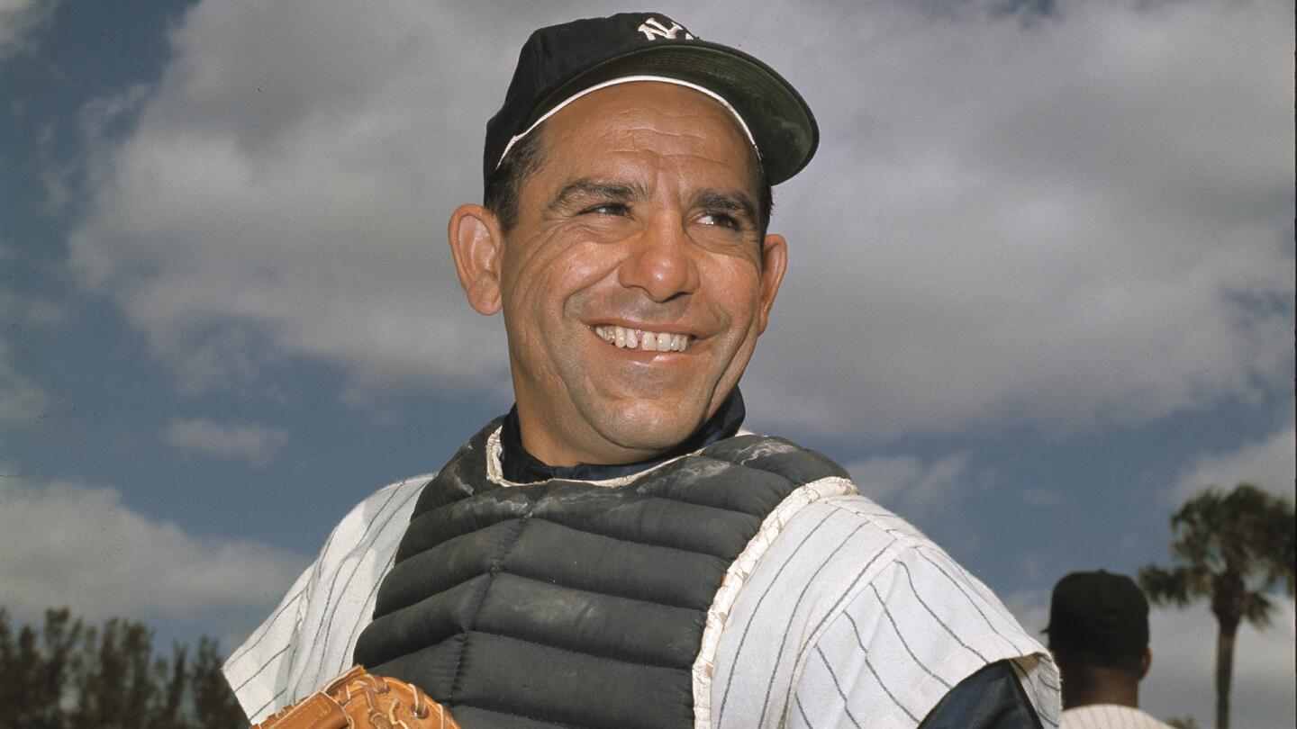 New York Yankee catcher Yogi Berra poses at spring training in Florida, in an undated file photo.