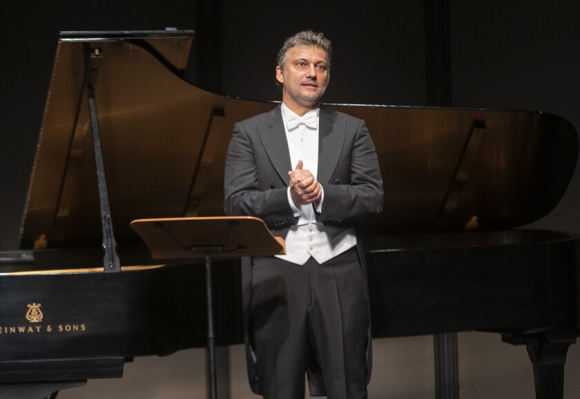 Jonas Kaufmann, in white tie and tails, prepares to perform at the Broad Stage in Santa Monica.