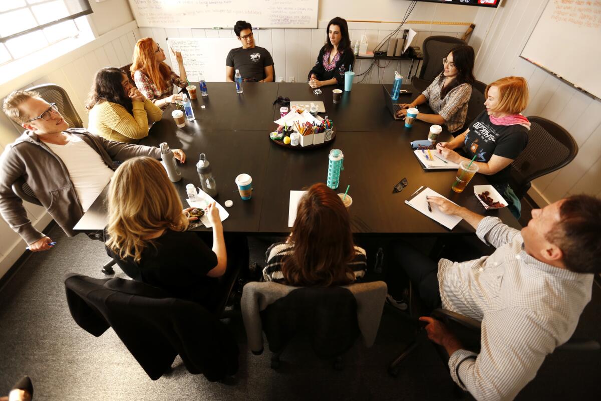 Aline Brosh-McKenna, center right, co-creator and showrunner of the CW's "Crazy Ex-Girlfriend," at a writing session during the planning of the series' third season on September 26, 2017.