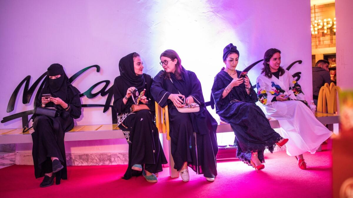 Women wait for the show at Al Comedy Club in Jidda, Saudi Arabia.