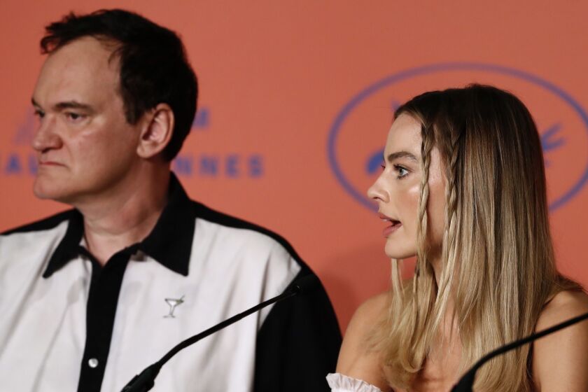 CANNES, FRANCE - MAY 22: Director Quentin Tarantino and Margot Robbie attend the "Once Upon A Time In Hollywood" Press Conference during the 72nd annual Cannes Film Festival on May 22, 2019 in Cannes, France. (Photo by John Phillips/Getty Images) ** OUTS - ELSENT, FPG, CM - OUTS * NM, PH, VA if sourced by CT, LA or MoD **