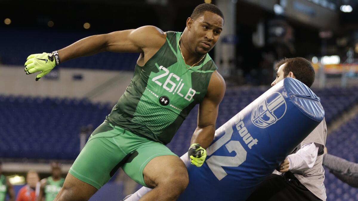 USC linebacker Hayes Pullard participates in a drill at the NFL Scouting Combine in Indianapolis on Sunday.