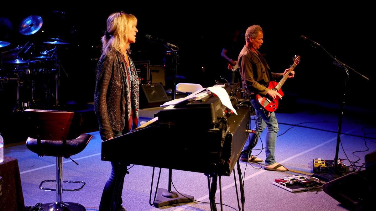 Christine McVie and Lindsey Buckingham rehearse last month at Sony Pictures Studios in Culver City.