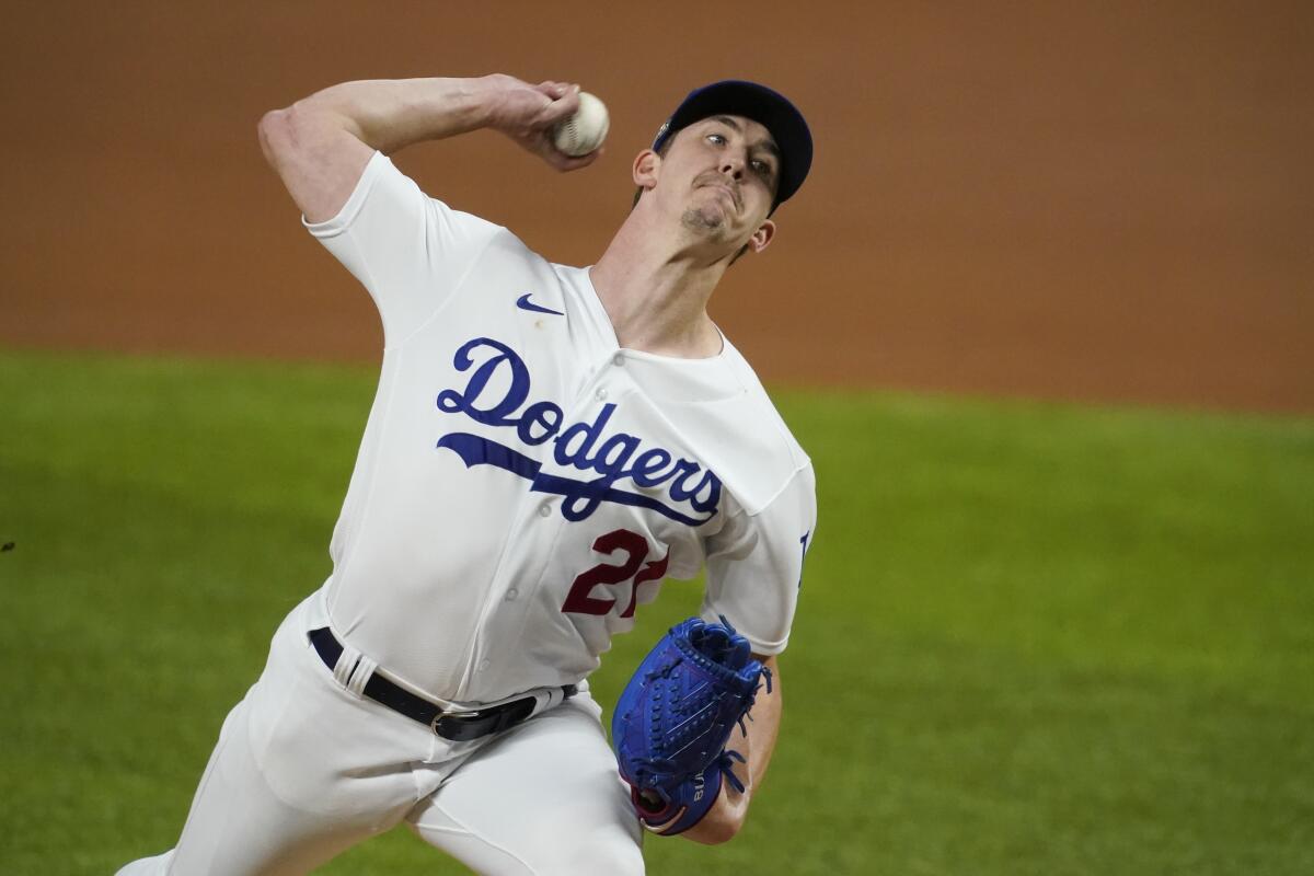 Los Angeles Dodgers starting pitcher Walker Buehler (21) throws against the San Diego Padres.