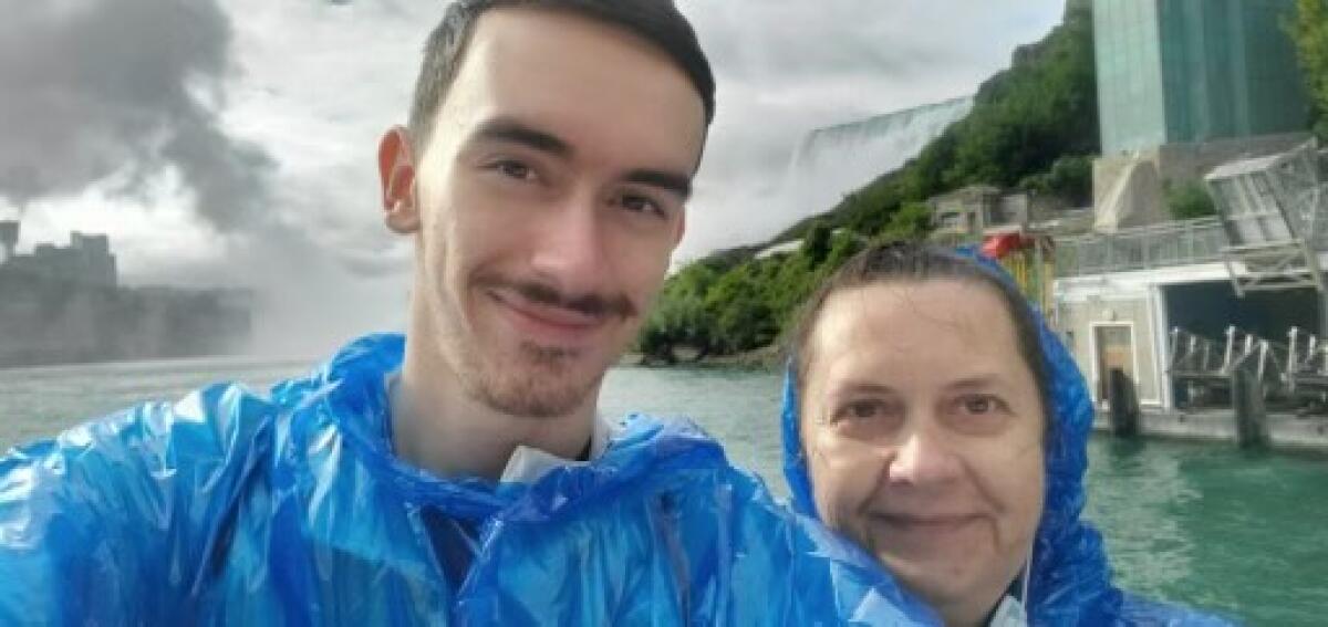 West Hollywood native Max Buydakov, left, stands next to his mother, Larisa Pereshivaylova, at Niagara Falls in August.