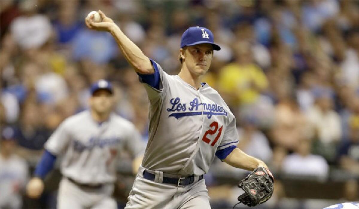 Zack Greinke's gave up five runs on nine hits through four innings with three walks and a strikeout during the Dodgers' loss to the Brewers, 5-2.