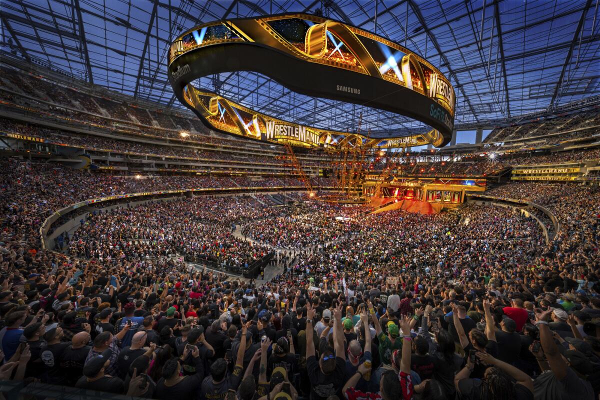 Fans attend the first night of WrestleMania 39 at SoFi Stadium in Inglewood. 