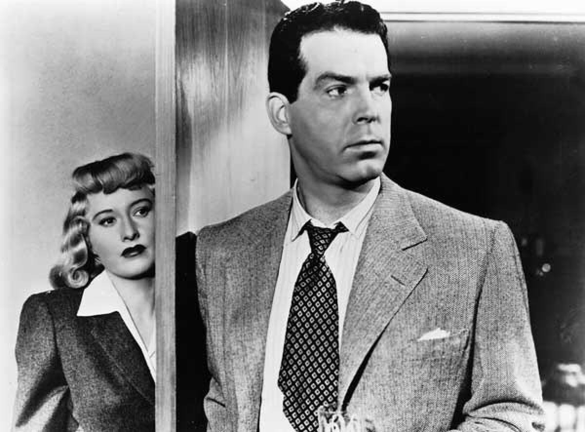 Barbara Stanwyck, left, and Fred MacMurray in the 1944 Billy Wilder film "Double Indemnity," which was nominated for seven Oscars but won none the year "Going My Way" won best picture.