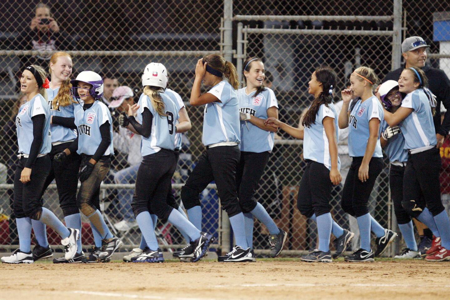 CV rejoices after winning a game against Westchester at Kent D. Face Field in Westchester on Thursday, July 26, 2012. CV wins the championship game against Westchester.