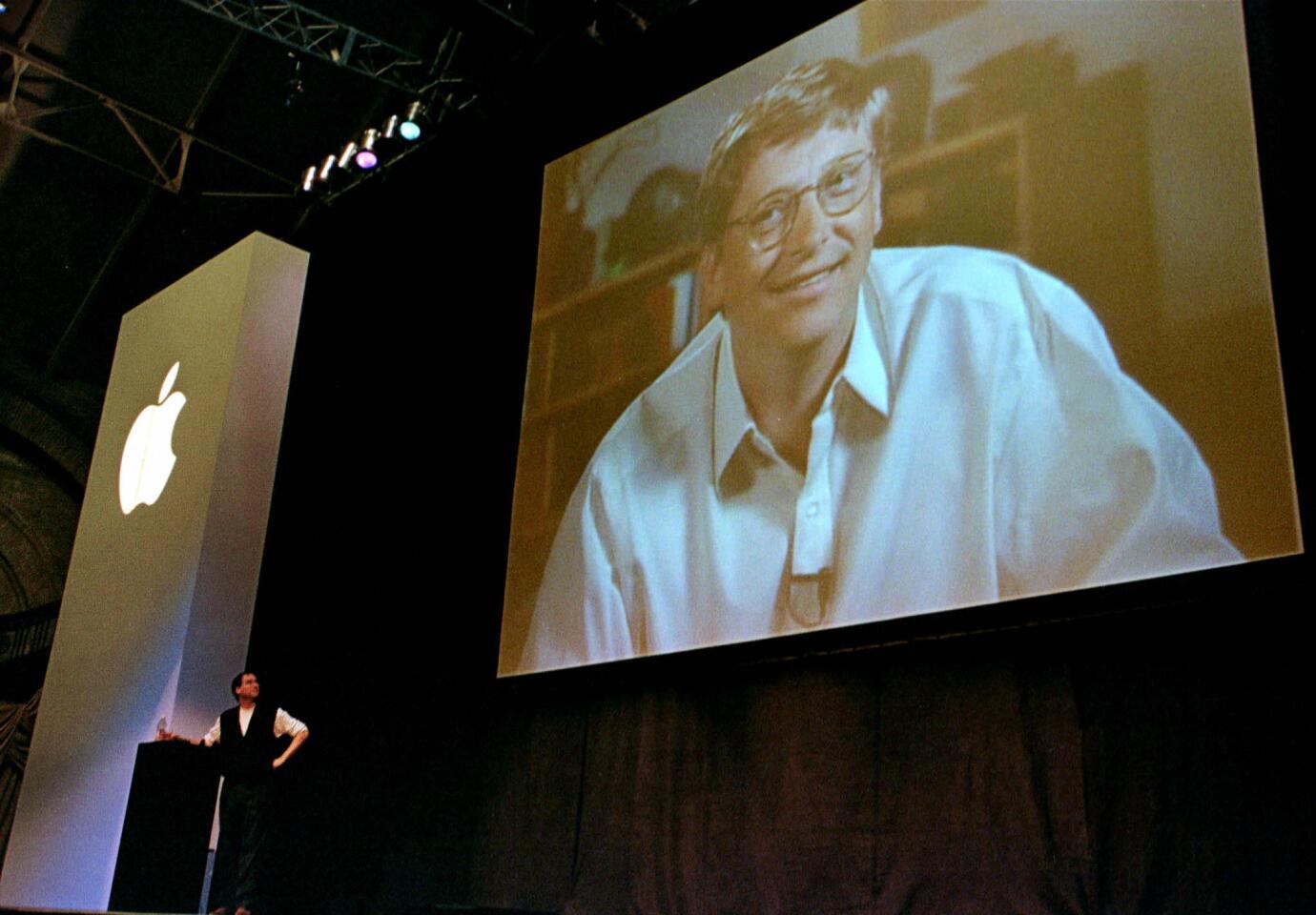 steve jobs and bill gates shaking hands