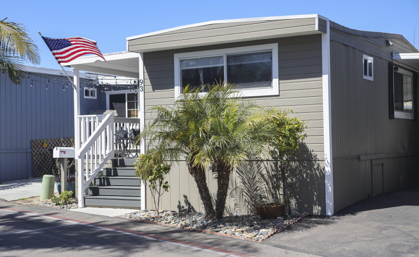 The couple and their children downsized from a four-bedroom home in Cardiff to a 1,000-square-foot mobile home in Carlsbad.