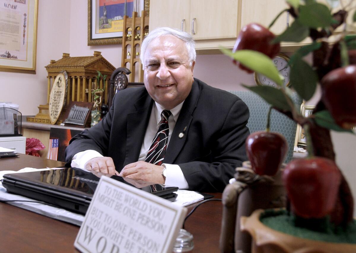 Dr. Garbis Der Yeghiayan, president of Mashdots College in Glendale, will take nearly 30 people to visit historic Western Armenia to revisit their roots. He is pictured at his office on Thursday, January 30, 2014.