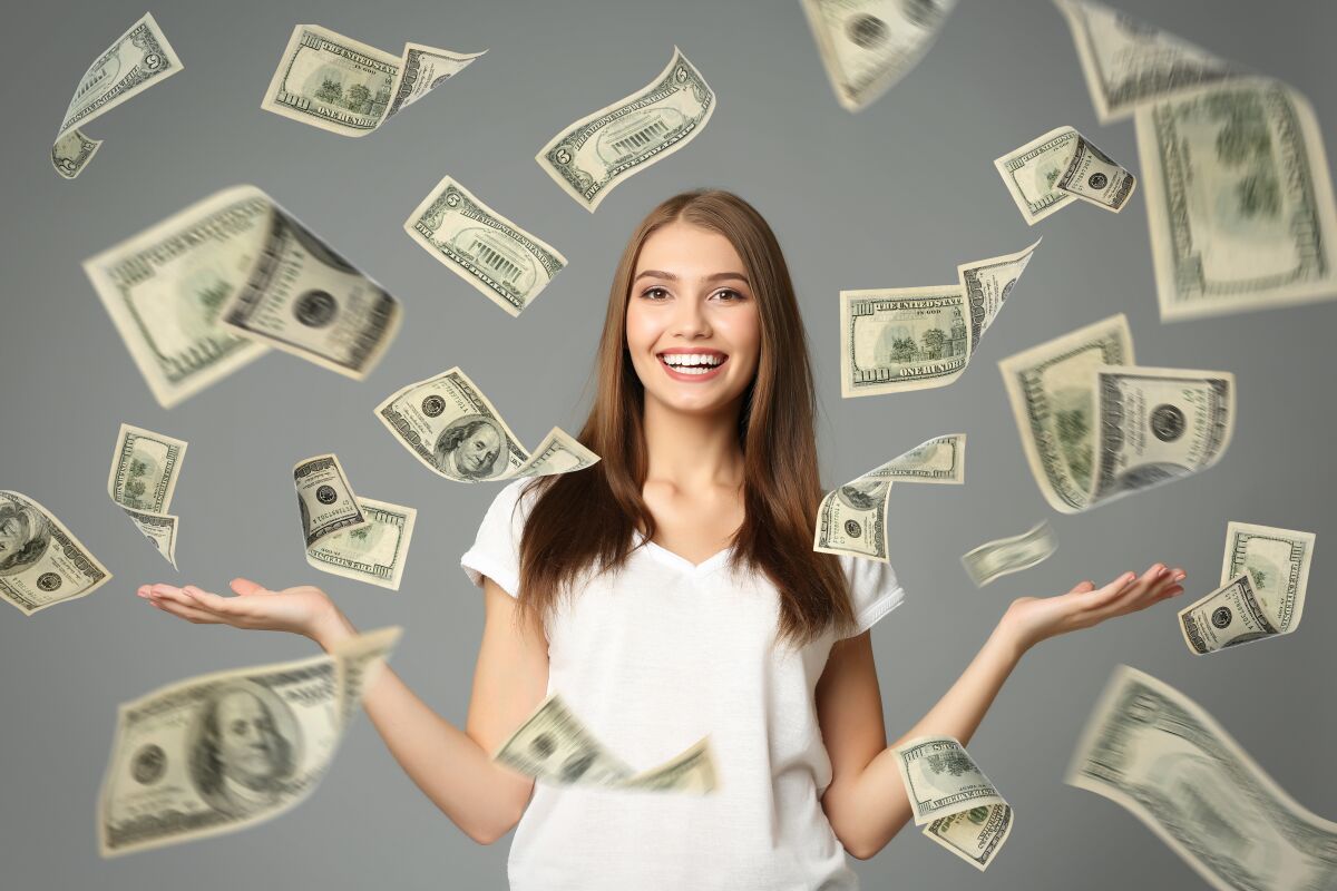 Young woman with money