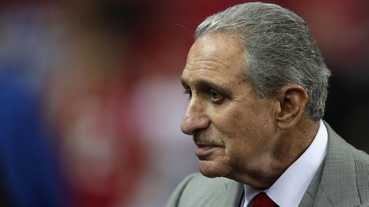Atlanta Falcons owner Arthur Blank watches the team warm up prior to a game against Seattle on Jan. 14.