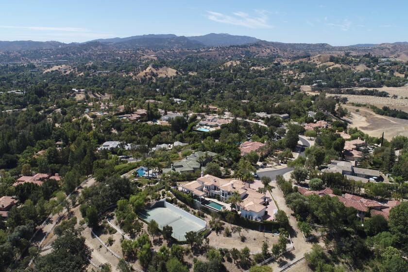 Hidden Hills, CA - August 12 Aerial images of the wealthy enclave of Hidden Hills on Friday, Aug. 12, 2022 in Hidden Hills, CA. (Brian van der Brug / Los Angeles Times)