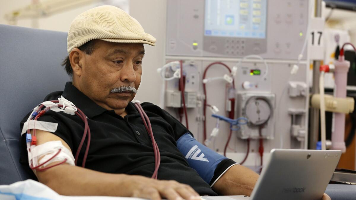 Patient Adrian Perez undergoes dialysis at a DaVita clinic in Sacramento. The company spent lavishly on a successful campaign to kill a ballot measure that would have capped its California revenue.