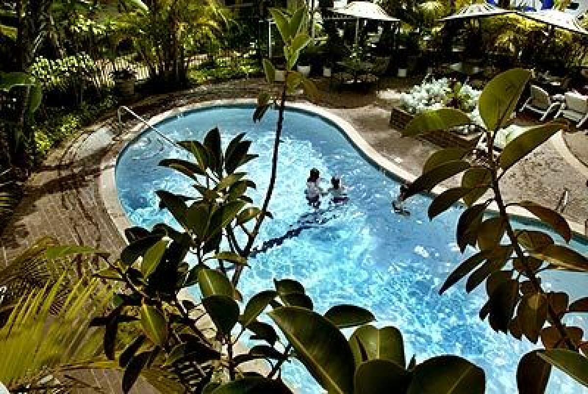 Laguna Reef Inn's landscaped pool area is a fine setting for an afternoon of relaxation.