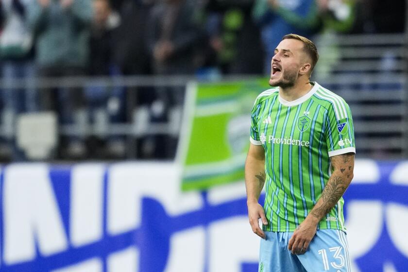 Seattle Sounders forward Jordan Morris reacts after scoring against the Vancouver Whitecaps during the first half of an MLS soccer match Saturday, May 18, 2024, in Seattle. (AP Photo/Lindsey Wasson)