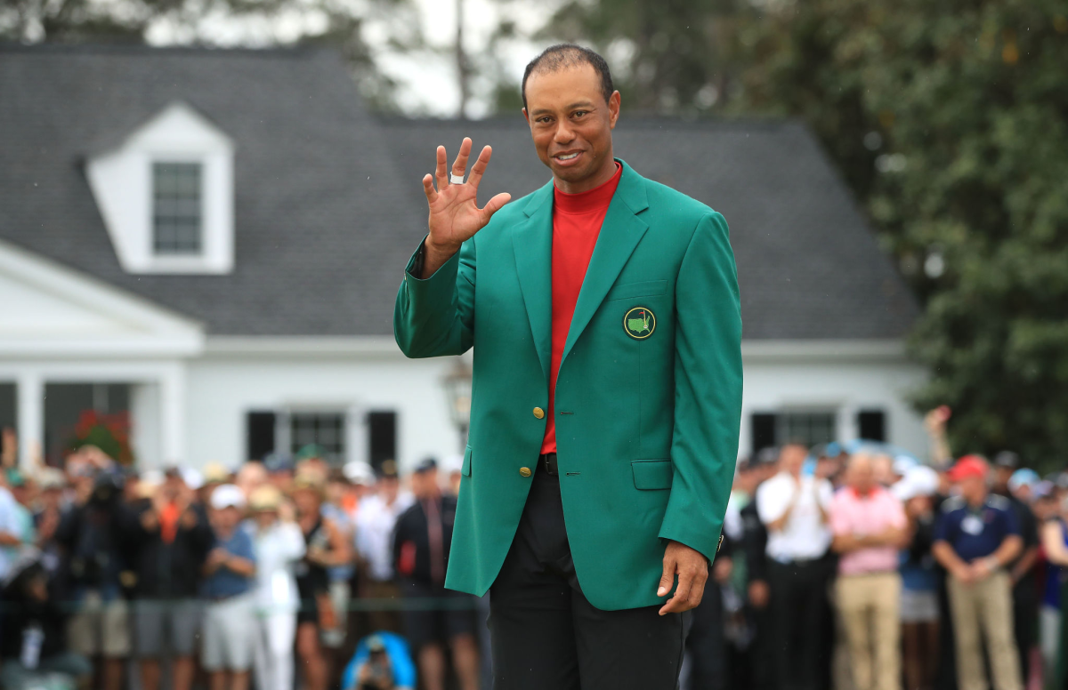 Tiger Woods wears the green jacket after winning the 2019 Masters at Augusta National.
