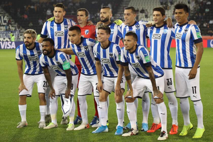 Monterrey's starting eleven pose for a group picture ahead of the 2019 FIFA Club World Cup quarter-final football match between Monterrey and al-Sadd at Jassim Bin Hamad Stadium in Doha on December 14, 2019. (Photo by KARIM JAAFAR / AFP) (Photo by KARIM JAAFAR/AFP via Getty Images) ** OUTS - ELSENT, FPG, CM - OUTS * NM, PH, VA if sourced by CT, LA or MoD **