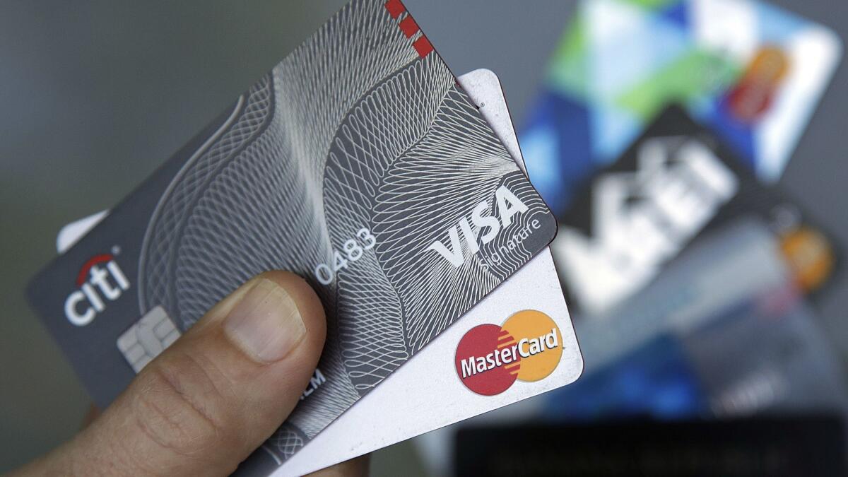 A group of 19 merchants and trade groups alleged Visa and MasterCard conspired to fix fees that are charged to stores for handling credit card payments.