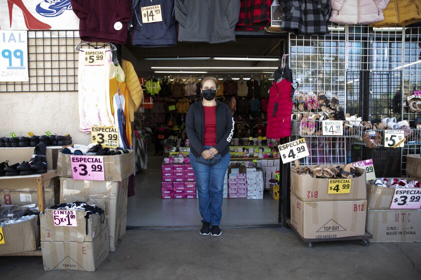 San Ysidro, California - November 08: Olivia Campos, owner of Carolin Shoes, has been in the same location for two years and said she expected more people to be shopping during the day the U.S.-Mexico border reopened on Monday, Nov. 8, 2021 in San Ysidro, California. The border has been closed to non-essential travel since March 2020 but restrictions are now lifted for those fully vaccinated. (Ana Ramirez / The San Diego Union-Tribune)