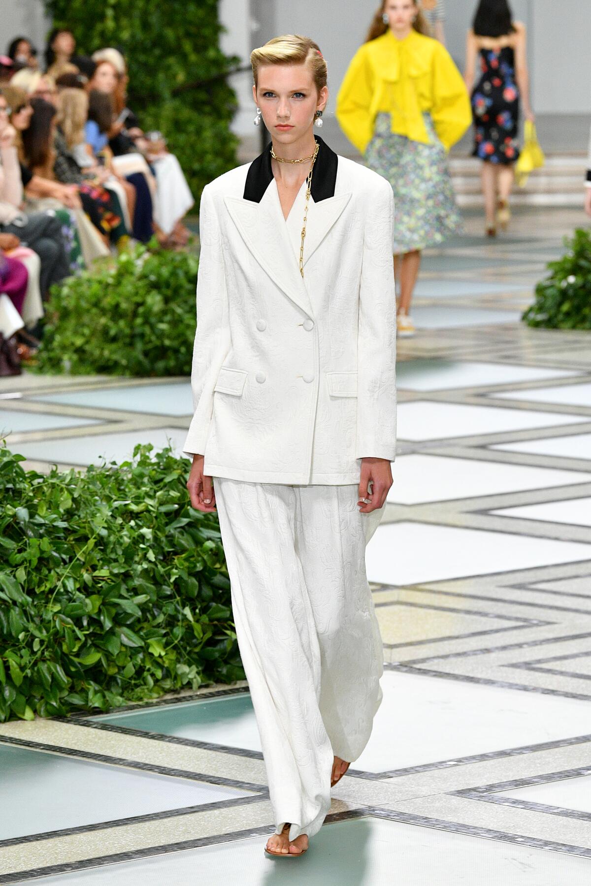 A photo of a model on the runway during Tory Burch's New York Fashion Week show. 