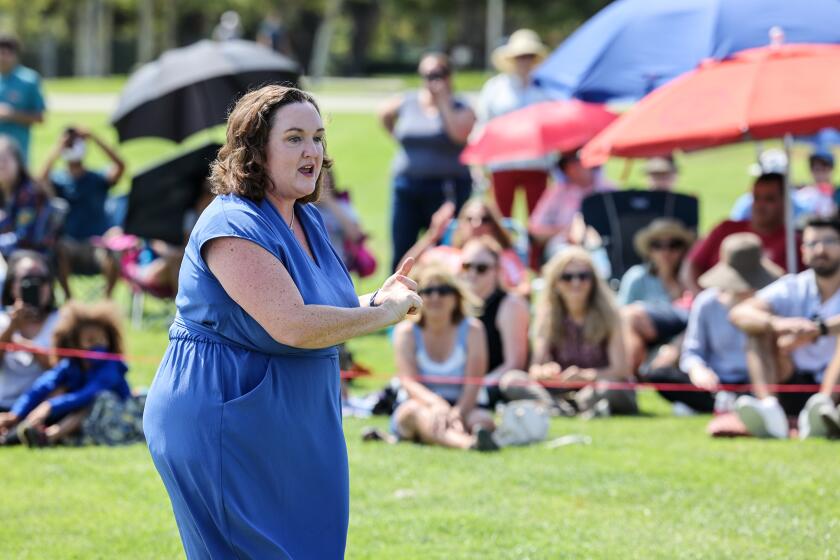 Irvine, CA, Sunday, July 11, 2021 - Representative Katie Porter (D-CA45) speaks without the help of a microphone during a town hall meeting with at Mike Ward Community Park. (Robert Gauthier/Los Angeles Times)
