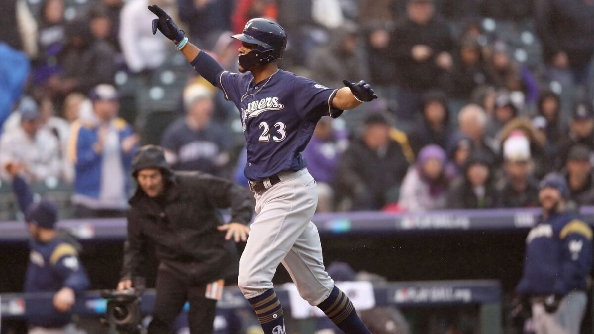 Milwaukee Brewers' Keon Broxton celebrates after hitting a solo homerun in the ninth inning.