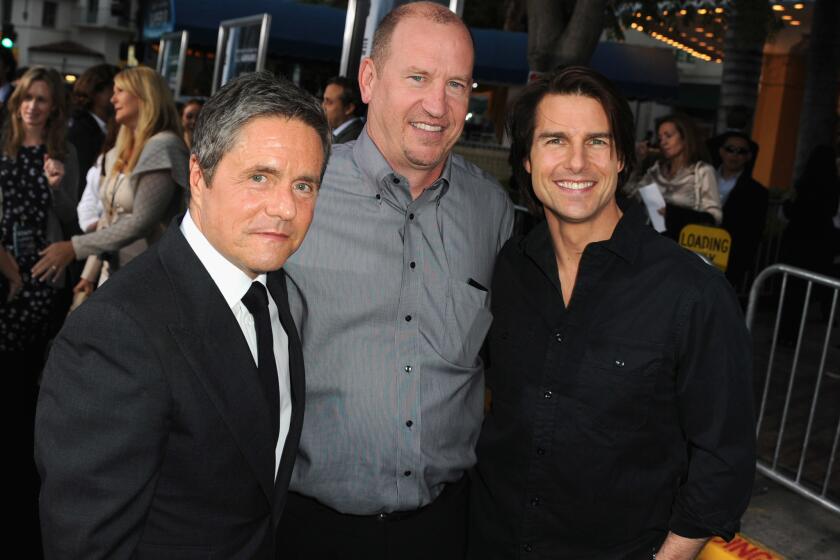 Paramount Pictures Chairman Brad Grey, left, with former Vice Chairman Rob Moore and actor Tom Cruise in 2011. Moore was fired on Friday