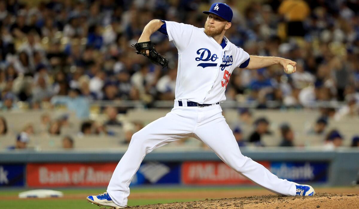 Dodgers pitcher J.P. Howell pitches in relief during the eighth inning of a game against the San Francisco Giants at Dodger Stadium on April 16.