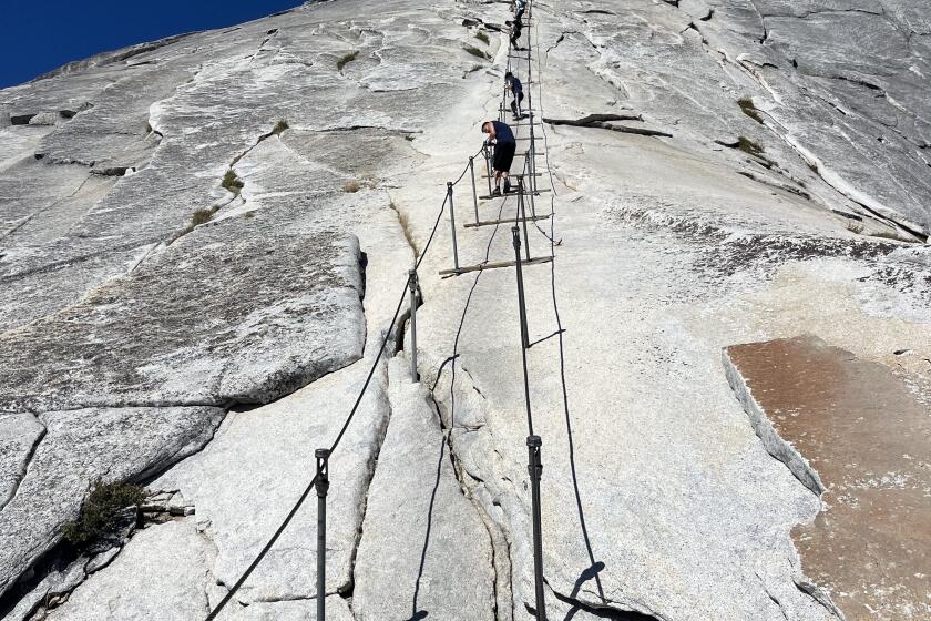 The Half Dome cables span the last 400 feet of an 8-mile one-way climb from Yosemite Valley to the top of Half Dome.