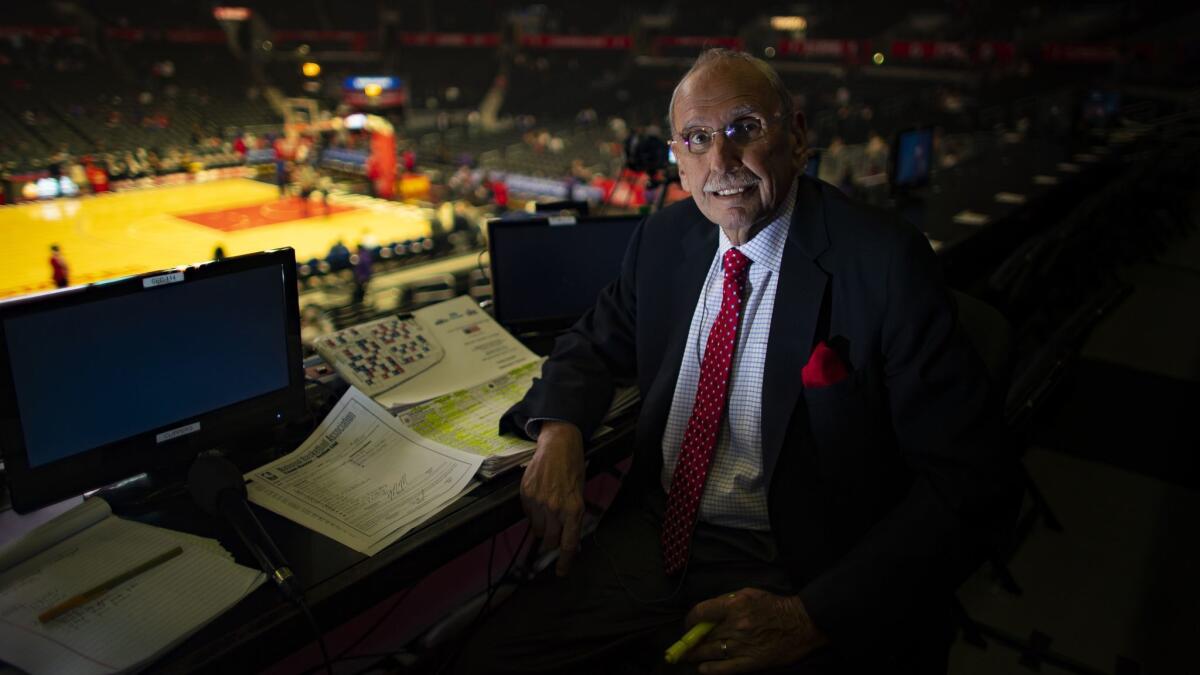 Clippers longtime broadcaster Ralph Lawler prepares before the start of the game against the Denver Nuggets at Staples Center on Dec. 22.