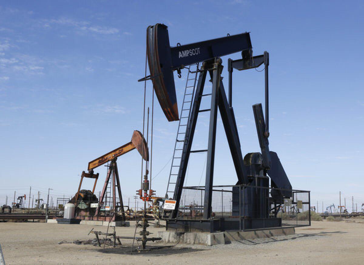 Oil pumps operate near Lost Hills, Calif. An initiative drive to create an oil tax in California fell short this week.