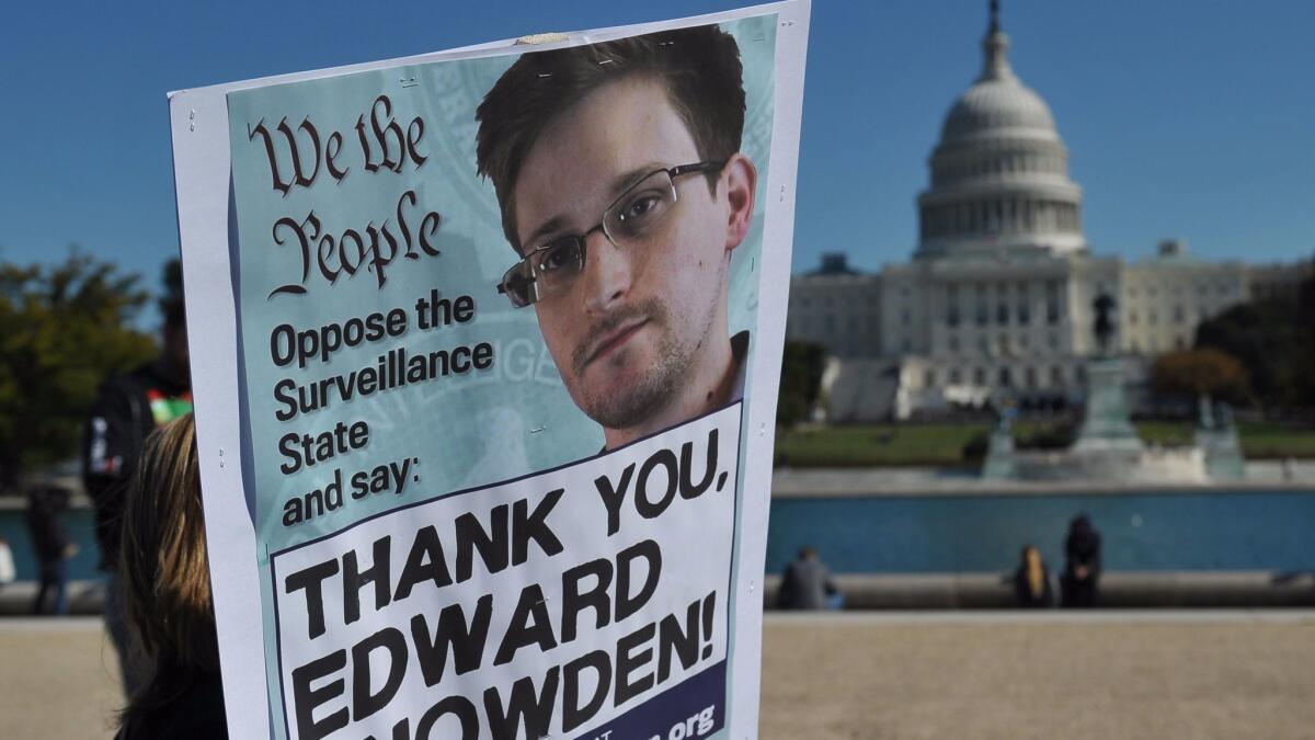 Demonstrators in front of the U.S. Capitol in Washington on Oct. 26, 2013, protest government surveillance.