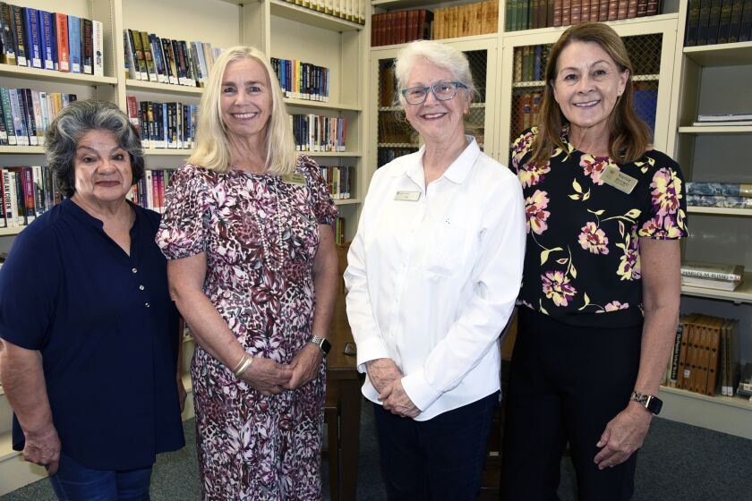 Children's librarian Sylvia Aspeytia, Guild ED Sara Shafer, retiring Librarian Jan Stephens, Guild employee Nancy Brown