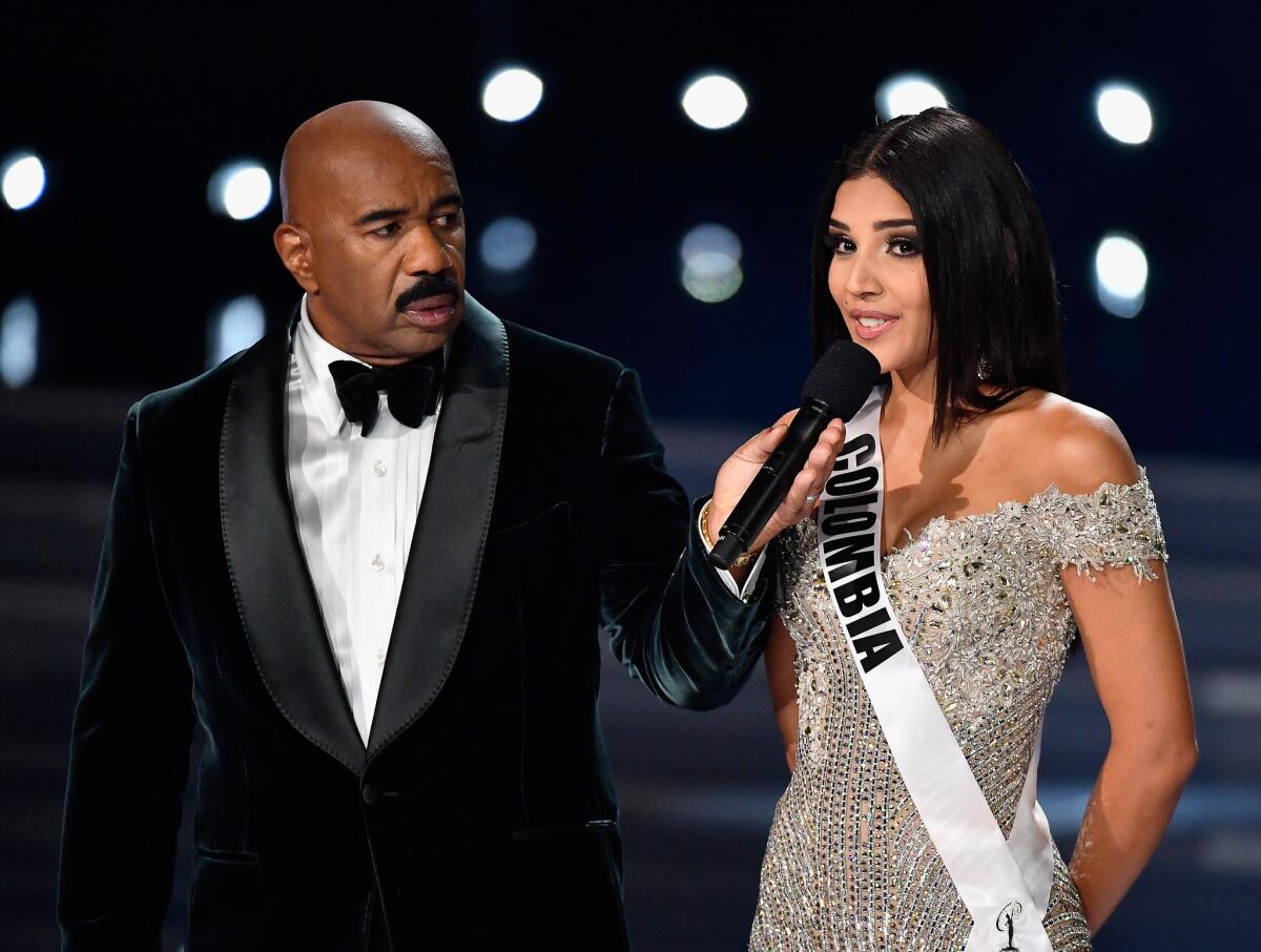LAS VEGAS, NV - NOVEMBER 26: Television personality and host Steve Harvey (L) onstage with Miss Colombia 2017 Laura Gonzalez as she answers a question during the interview portion of the 2017 Miss Universe Pageant at The Axis at Planet Hollywood Resort & Casino on November 26, 2017 in Las Vegas, Nevada. (Photo by Frazer Harrison/Getty Images) ** OUTS - ELSENT, FPG, CM - OUTS * NM, PH, VA if sourced by CT, LA or MoD **