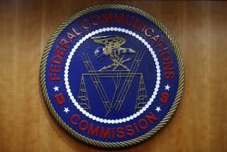 FILE - The seal of the Federal Communications Commission (FCC) is seen before an FCC meeting to vote on net neutrality in Washington on Dec. 14, 2017. Washington has expelled another state-owned Chinese phone carrier from the U.S. market over national security concerns amid rising tension with Beijing. (AP Photo/Jacquelyn Martin, File)