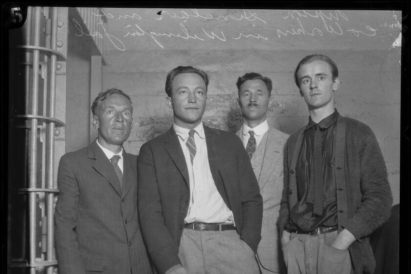 Upton Sinclair, left, Hunter Kimbrough, Pryns Hopkins and Hugh Hardyman in jail in a black and white photo