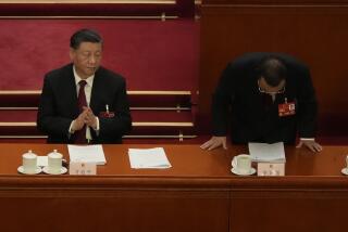 Chinese Premier Li Keqiang, right, bows after delivering his state of the nation address during the opening session of China's National People's Congress (NPC) at the Great Hall of the People in Beijing, Sunday, March 5, 2023. After a decade in Chinese President Xi Jinping's shadow, Li Keqiang is taking his final bow as the country's premier, marking a shift away from the skilled technocrats who have helped steer the world's second-biggest economy in favor of officials known mainly for their unquestioned loyalty to China's most powerful leader in recent history. (AP Photo/Ng Han Guan)